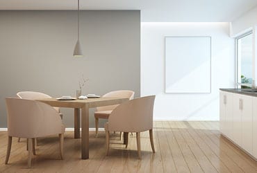 a dining room table and chairs in front of a window