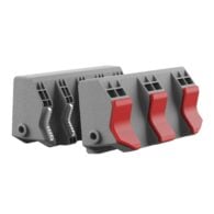 three red and gray plastic clips on a white background